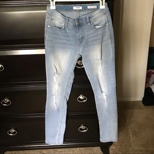 Distressed blue jean